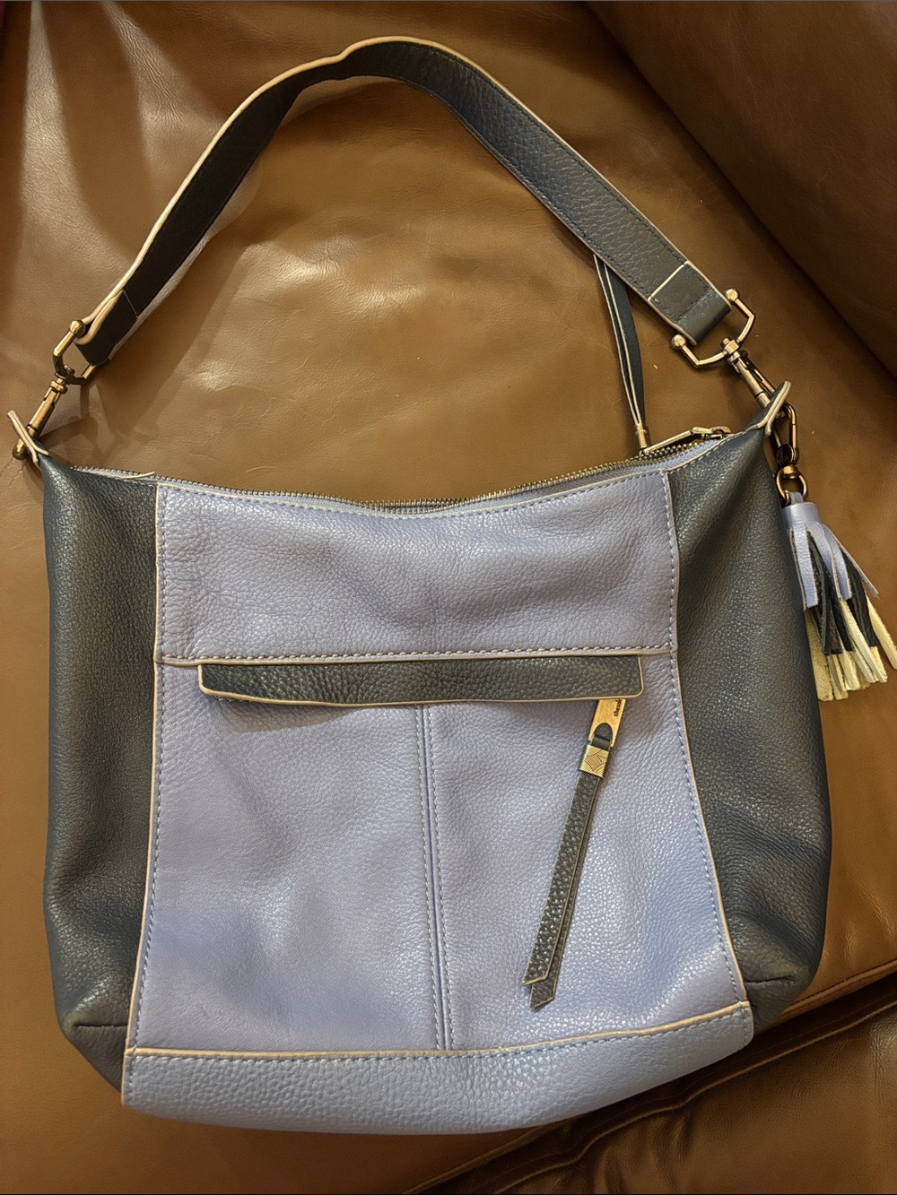 The Sak Ashland Blue Bell Leather Shoulder Bag with Tassel and silver hardware